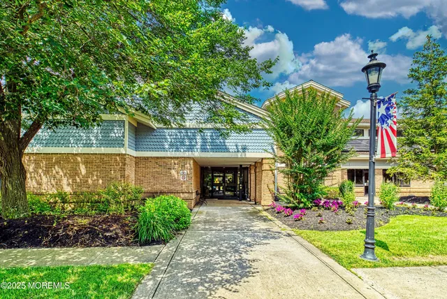 a view of yard with swimming pool and green space