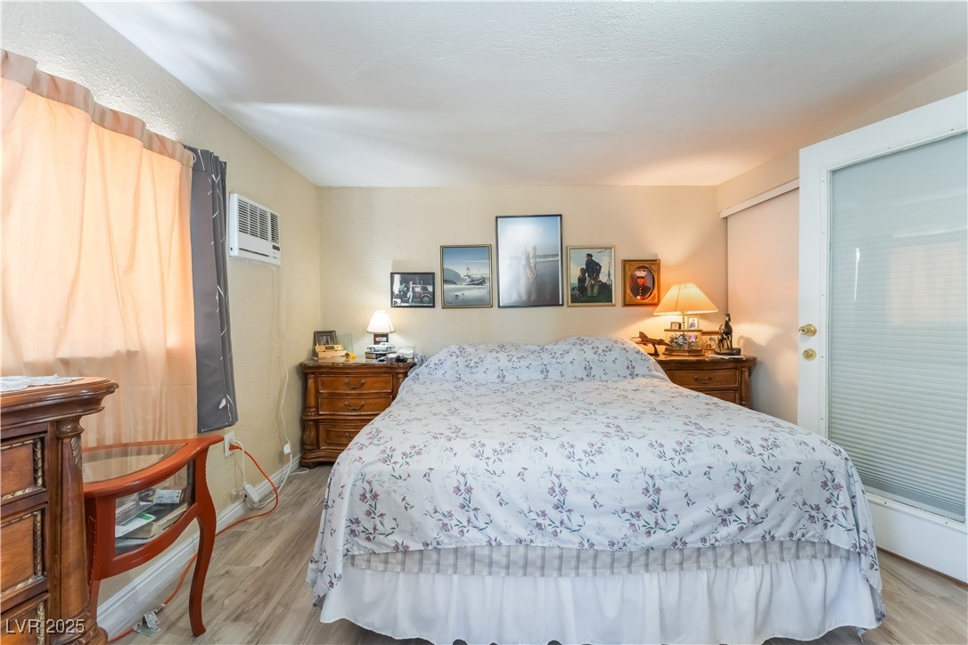 1908 Ardmore Street Las Vegas, NV 89104 - Photo 18 of 29 Bedroom with light wood finished floors