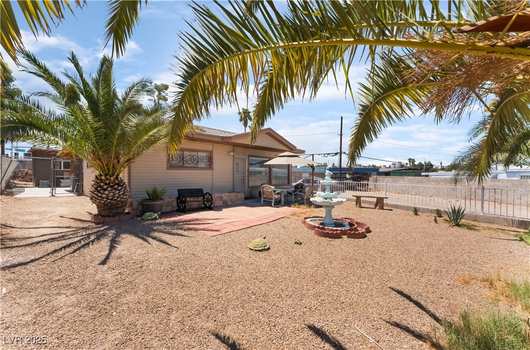 1908 Ardmore Street Las Vegas, NV 89104 - Photo 4 of 29 Rear view of property featuring a patio area