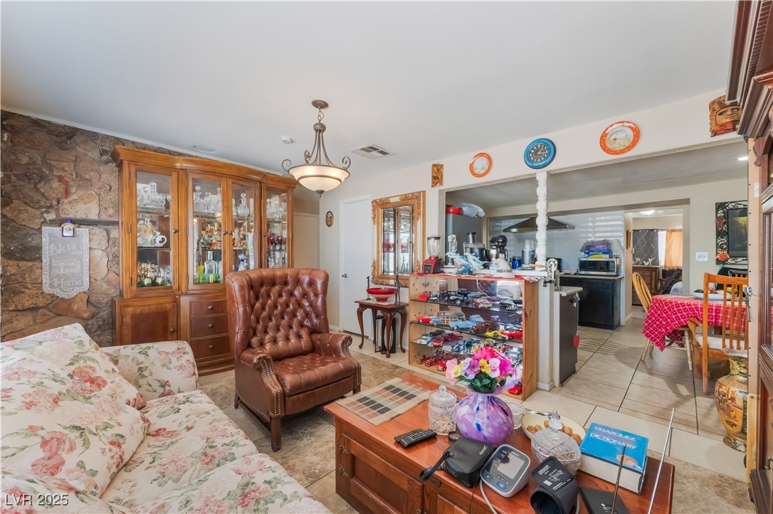 1908 Ardmore Street Las Vegas, NV 89104 - Photo 8 of 29 Living room featuring light tile patterned floors