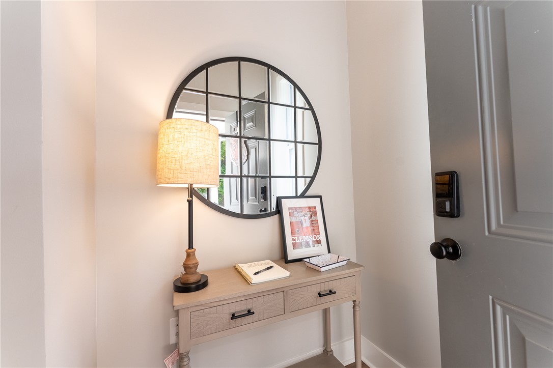 103 Riggs Drive Clemson, SC 29631 - Photo 37 of 50 A well-appointed entry provides a welcoming first impression with its console table and inviting glow.
