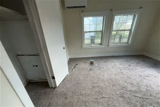 an empty room with windows