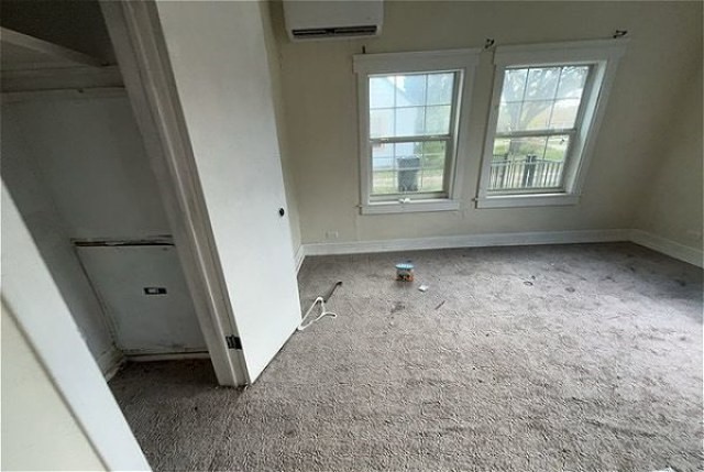 201 East 6th Street Alice, TX 78332 - Photo 6 of 6 an empty room with windows