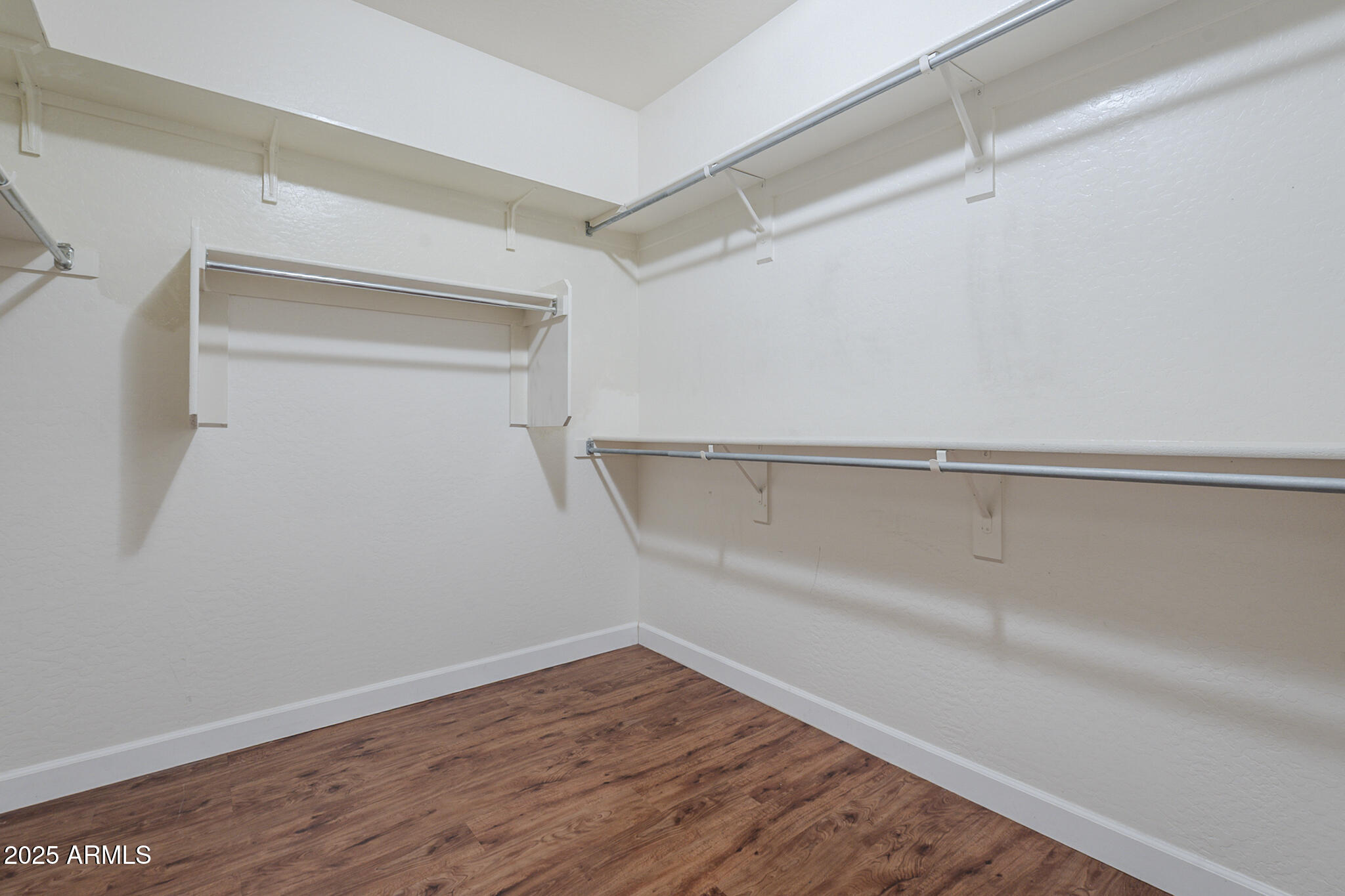 15902 West Hearn Road Surprise, AZ 85379 - Photo 16 of 73 a view of an empty walk in closet