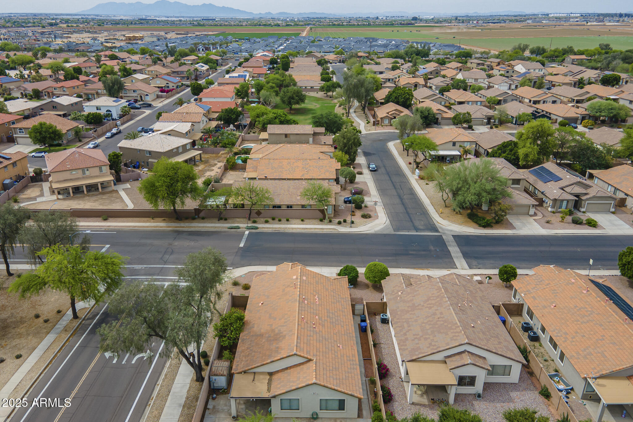 15902 West Hearn Road Surprise, AZ 85379 - Photo 28 of 73 an aerial view of residential houses with outdoor space and river