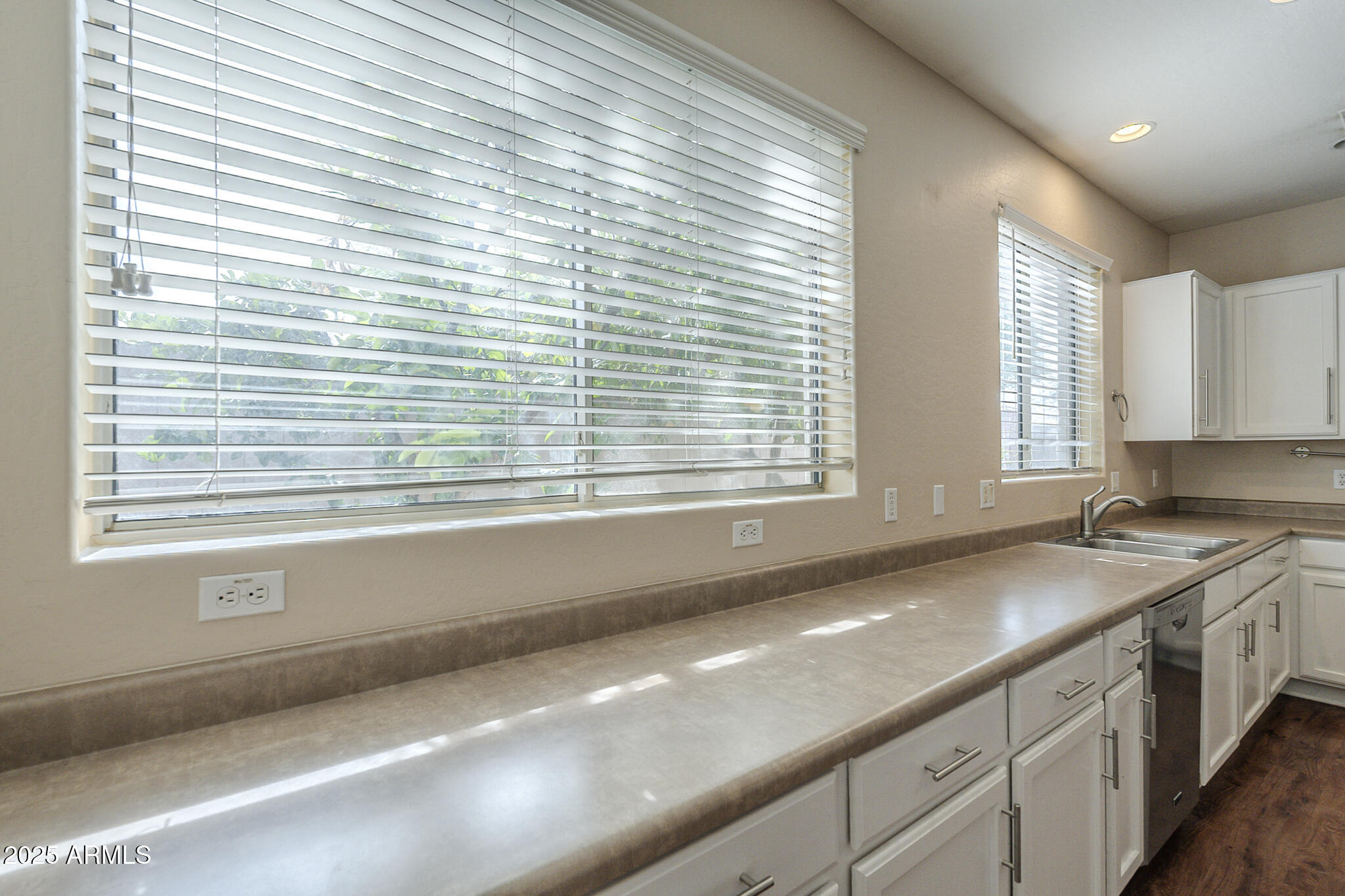 15902 West Hearn Road Surprise, AZ 85379 - Photo 37 of 73 a kitchen with a sink and a window