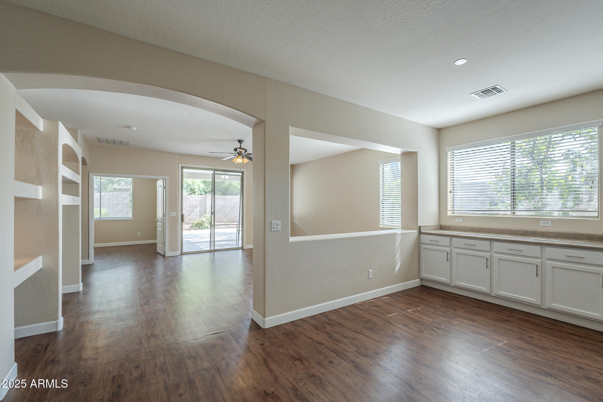 15902 West Hearn Road Surprise, AZ 85379 - Photo 39 of 73 wooden floor in an empty room with a window