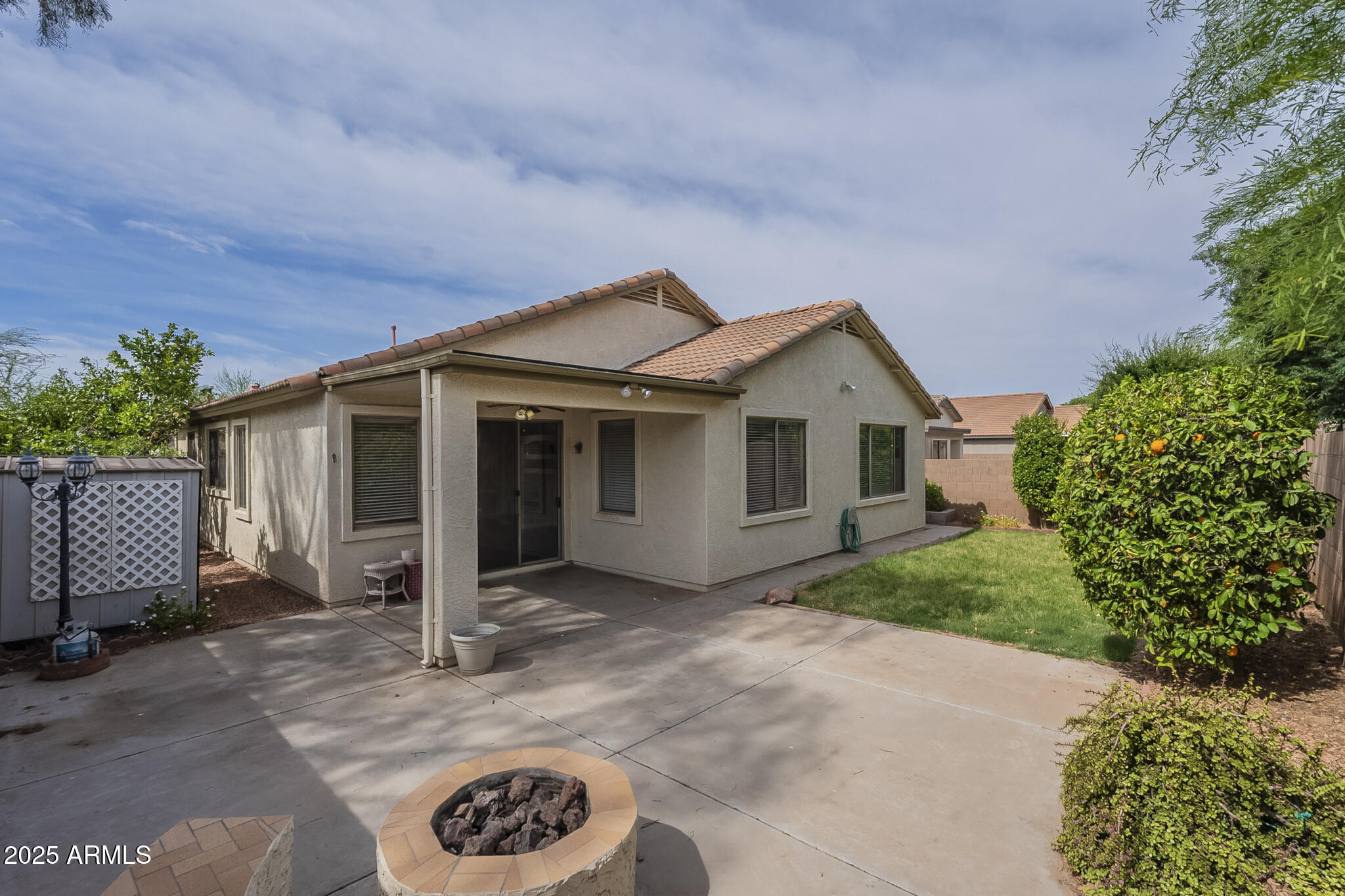 15902 West Hearn Road Surprise, AZ 85379 - Photo 66 of 73 a front view of a house with a garden