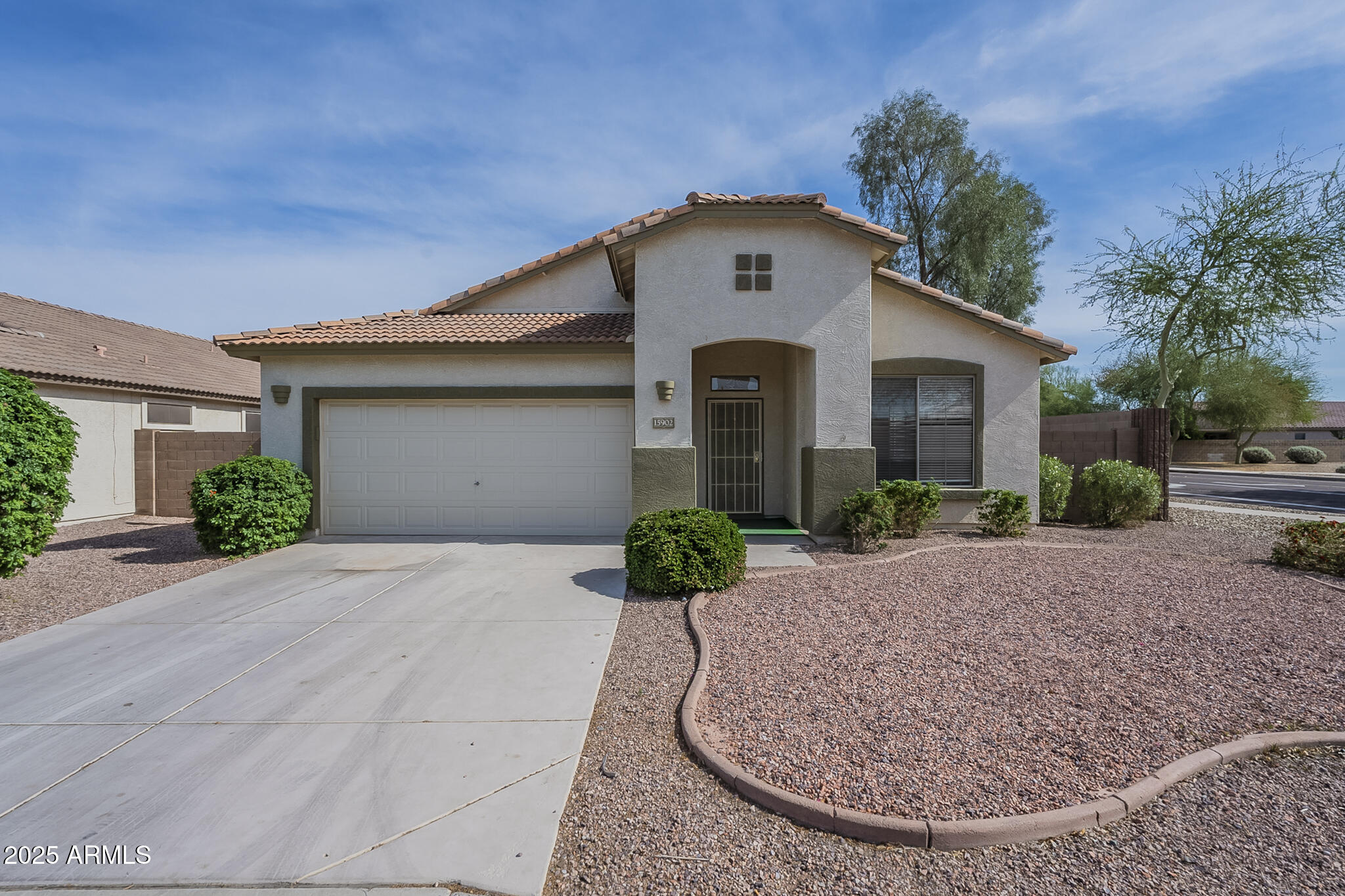 15902 West Hearn Road Surprise, AZ 85379 - Photo 72 of 73 a front view of a house with garden