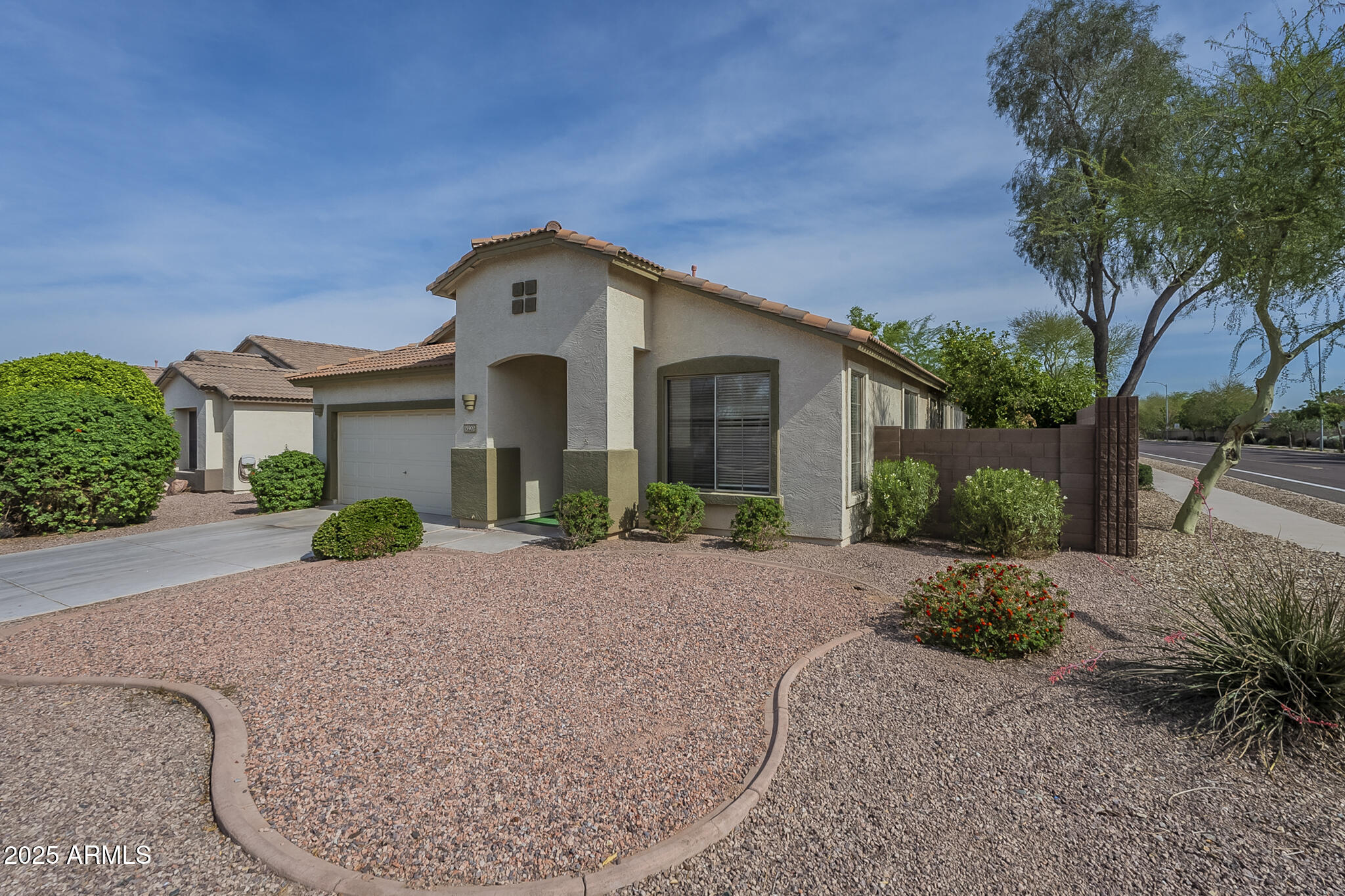 15902 West Hearn Road Surprise, AZ 85379 - Photo 73 of 73 a front view of a house with garden