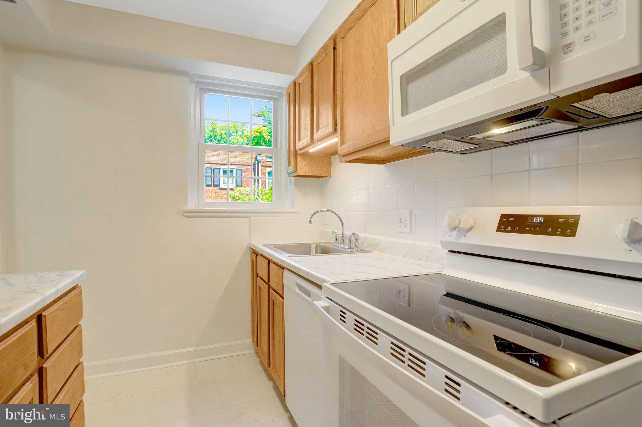 4837 27th Road South Arlington, VA 22206 - Photo 1 of 34 a view of a kitchen with sink and window