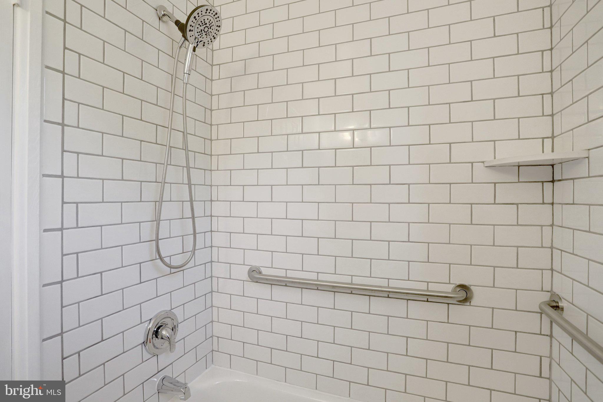 4837 27th Road South Arlington, VA 22206 - Photo 16 of 34 a bathroom with a shower