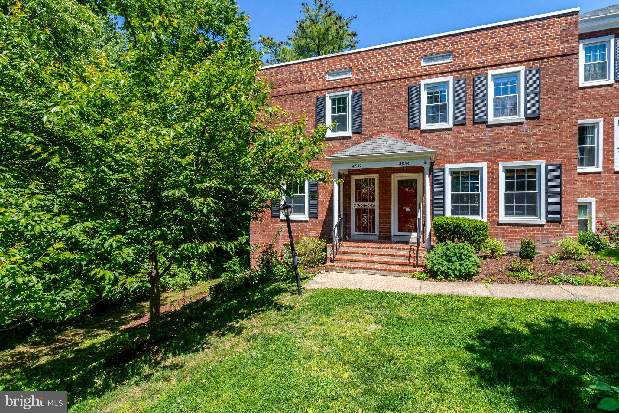 4837 27th Road South Arlington, VA 22206 - Photo 2 of 34 a front view of a house with a yard