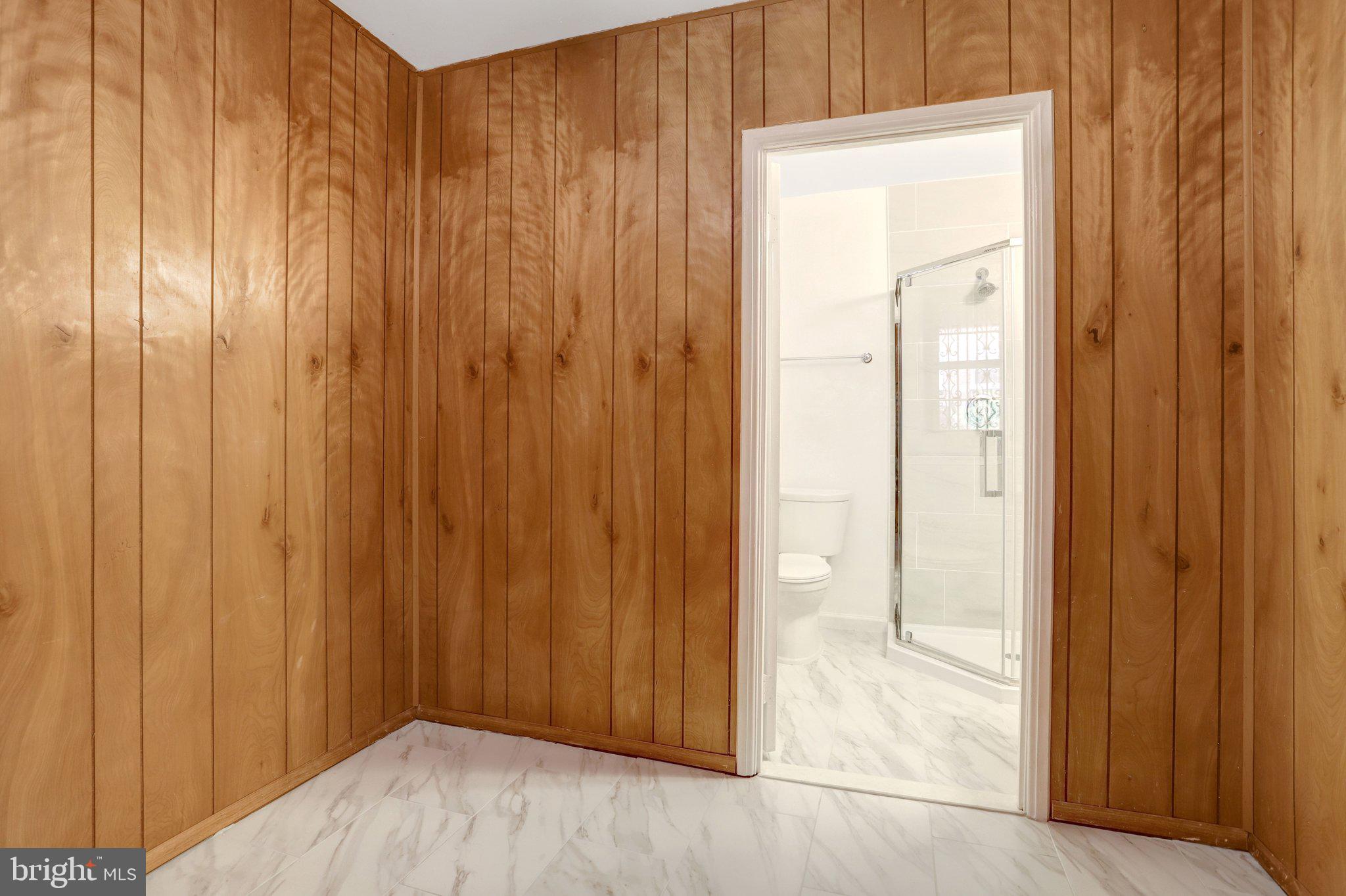 4837 27th Road South Arlington, VA 22206 - Photo 27 of 34 a view of an entryway with wooden floor