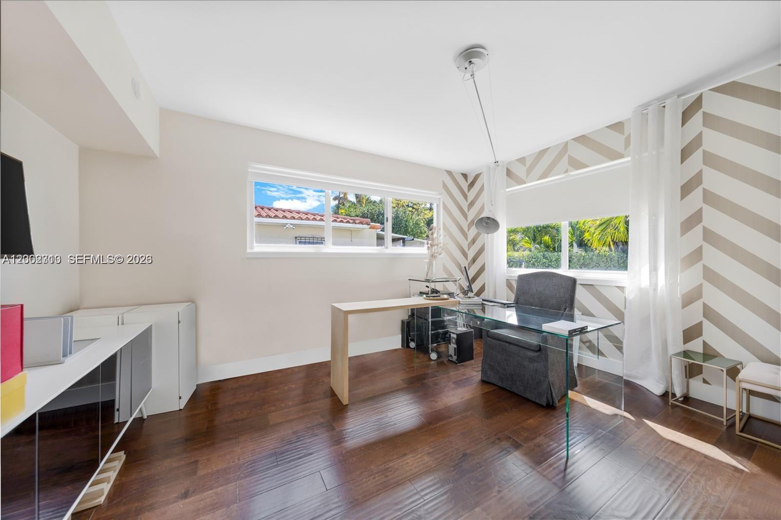 3531 Southwest 1st Avenue Miami, FL 33145 - Photo 14 of 44 a living room with furniture a window and wooden floor