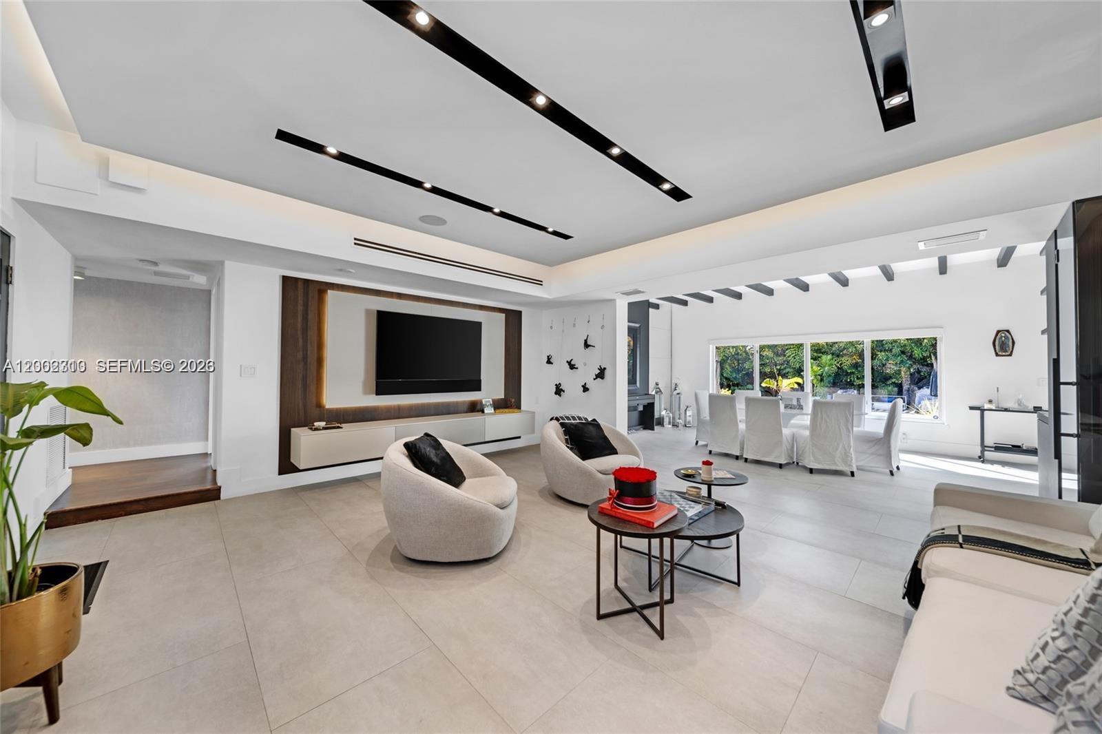 3531 Southwest 1st Avenue Miami, FL 33145 - Photo 28 of 44 a living room with furniture and a flat screen tv