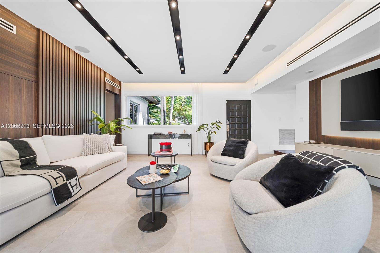 3531 Southwest 1st Avenue Miami, FL 33145 - Photo 29 of 44 a living room with furniture and a large window