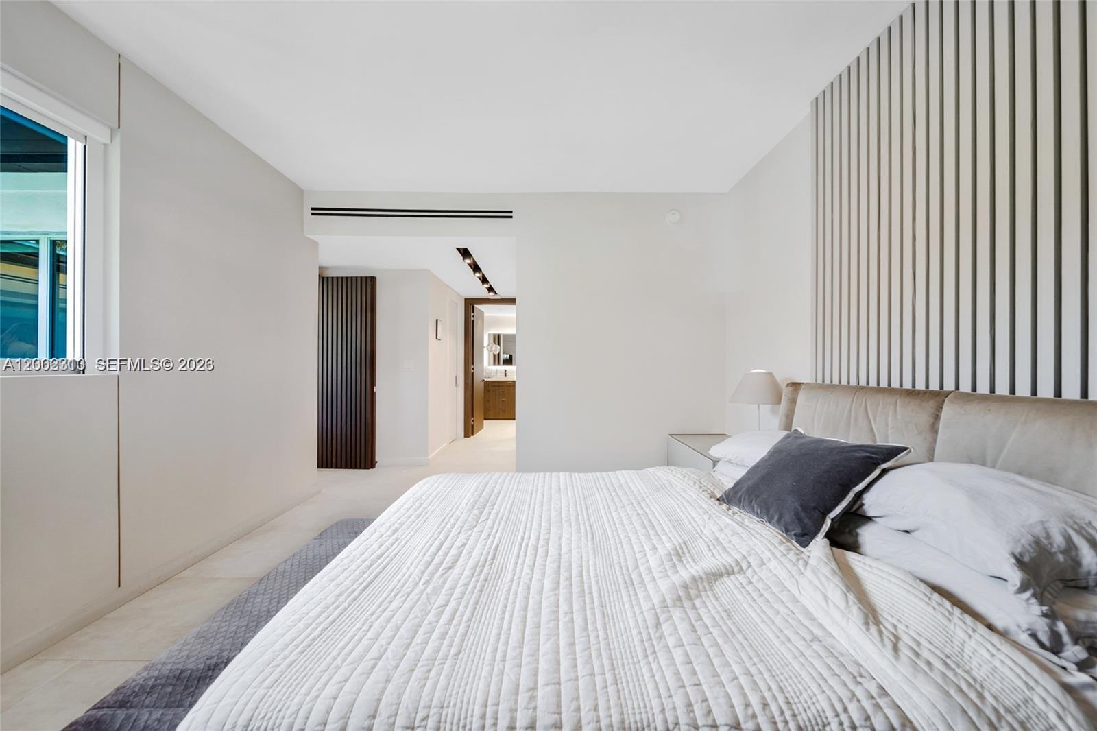 3531 Southwest 1st Avenue Miami, FL 33145 - Photo 31 of 44 a bedroom with a bed and a window