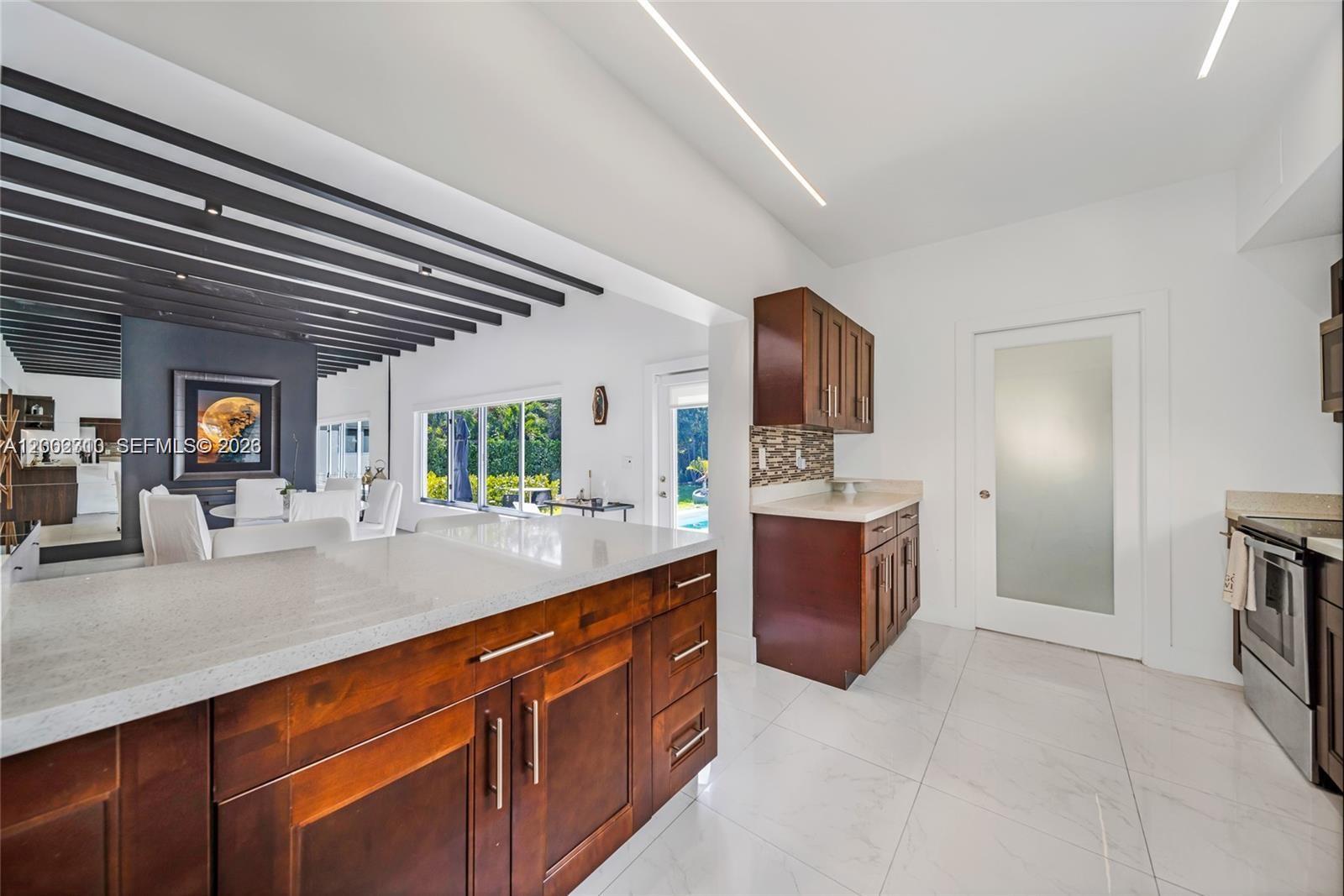 3531 Southwest 1st Avenue Miami, FL 33145 - Photo 32 of 44 a view of living room with furniture and flat screen tv