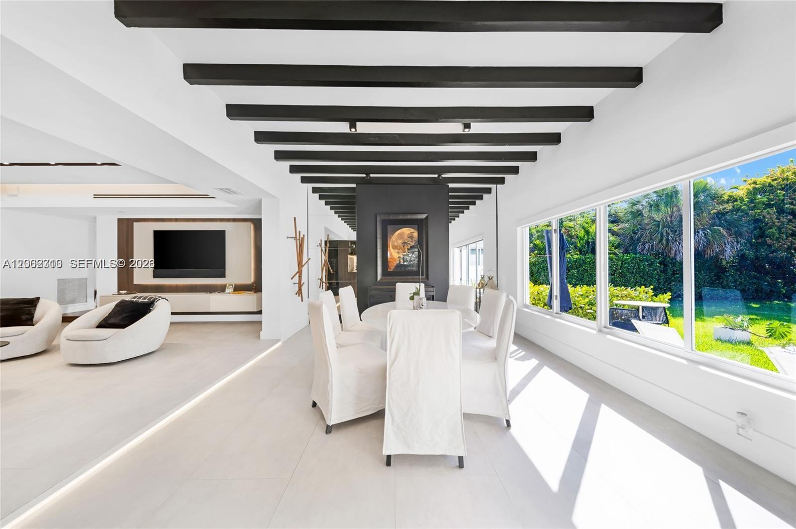 3531 Southwest 1st Avenue Miami, FL 33145 - Photo 34 of 44 a living room with furniture and a flat screen tv