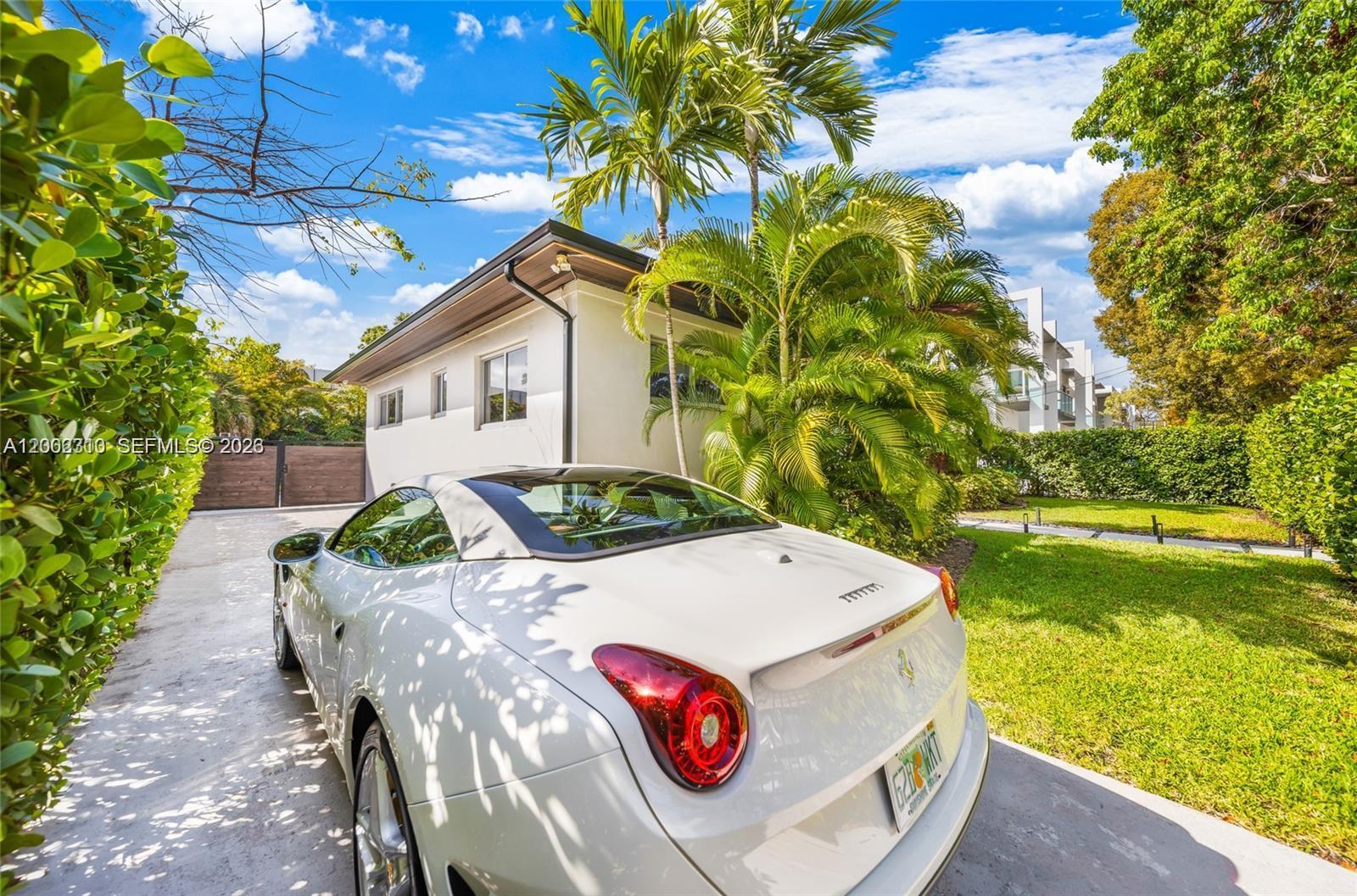 3531 Southwest 1st Avenue Miami, FL 33145 - Photo 35 of 44 a view of a house with pool and a yard