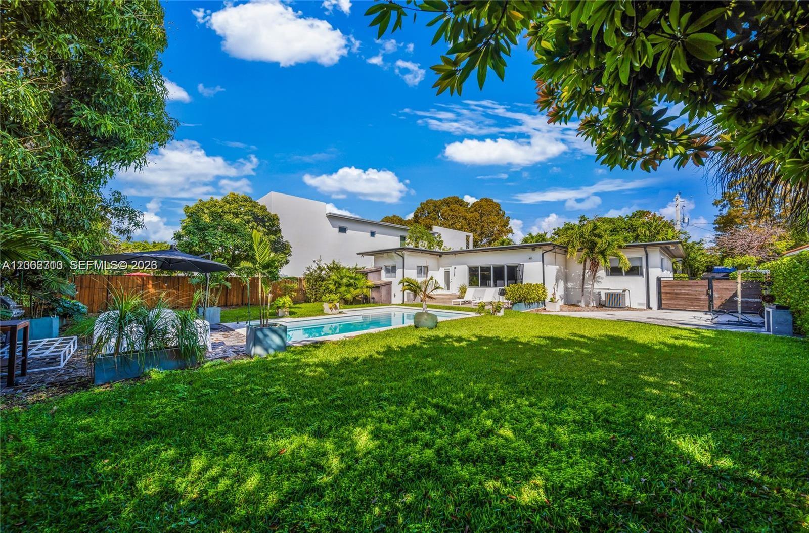 3531 Southwest 1st Avenue Miami, FL 33145 - Photo 38 of 44 a view of a house with a yard