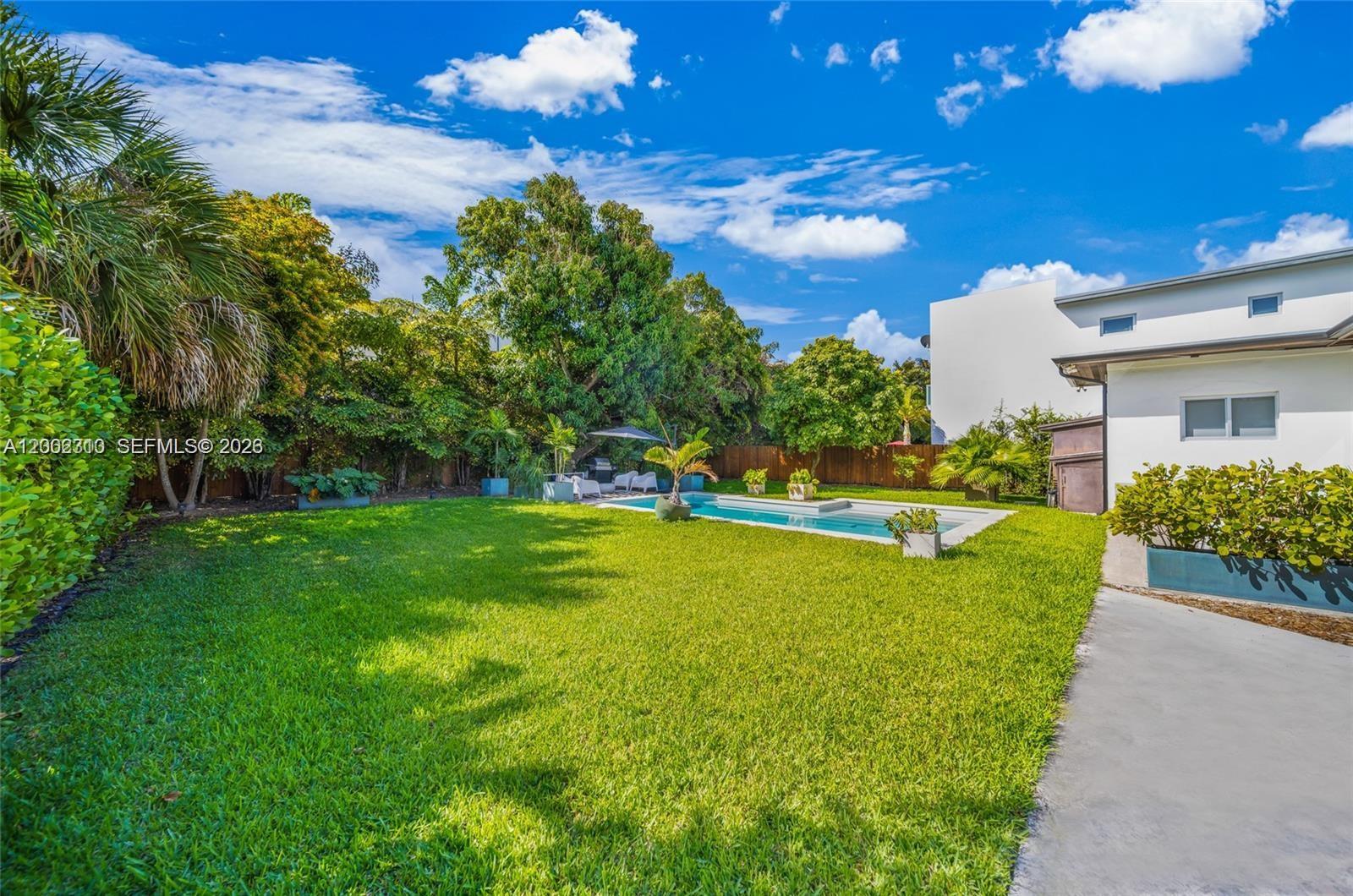 3531 Southwest 1st Avenue Miami, FL 33145 - Photo 39 of 44 a view of yard with swimming pool and green space