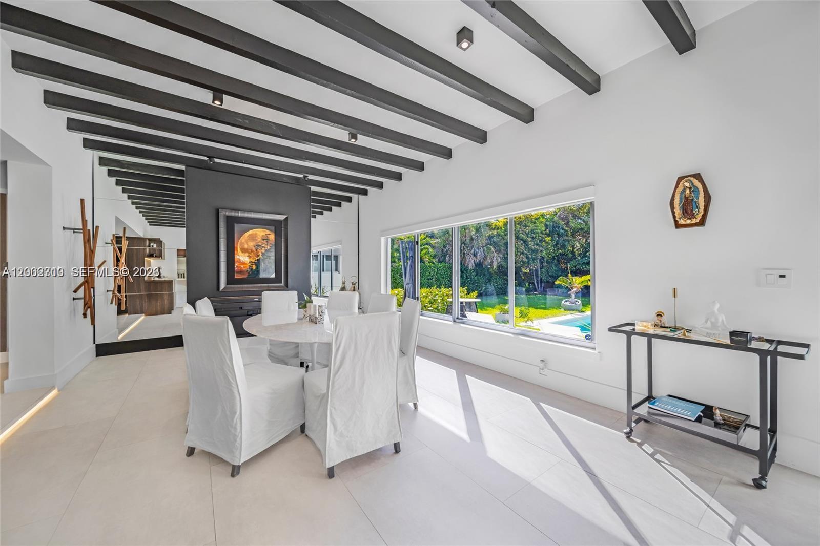 3531 Southwest 1st Avenue Miami, FL 33145 - Photo 9 of 44 a view of a livingroom with furniture and a window