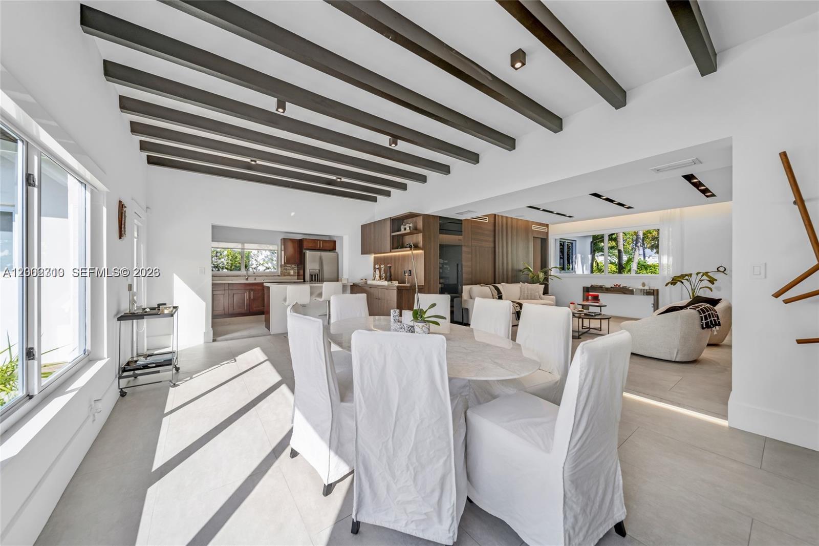 3531 Southwest 1st Avenue Miami, FL 33145 - Photo 10 of 44 a view of a kitchen with furniture and a large window