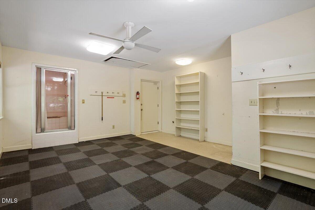 904 Kings Mill Road Chapel Hill, NC 27517 - Photo 26 of 33 a view of a room with a black and white checkered floor