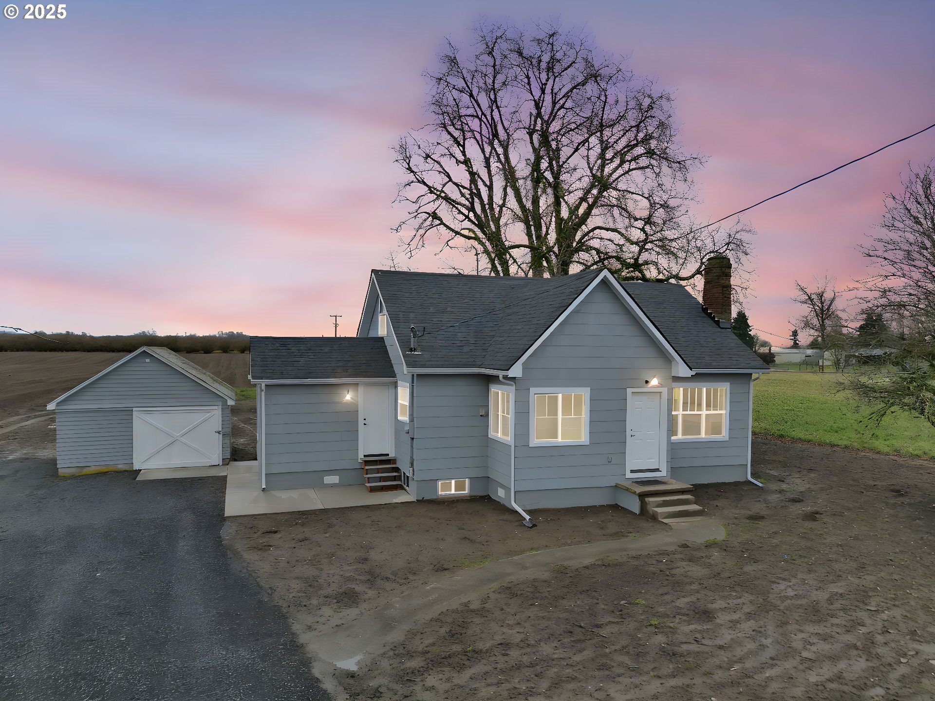 92910 River Road Junction City, OR 97448 - Photo 1 of 43 a view of a house with a yard and large tree