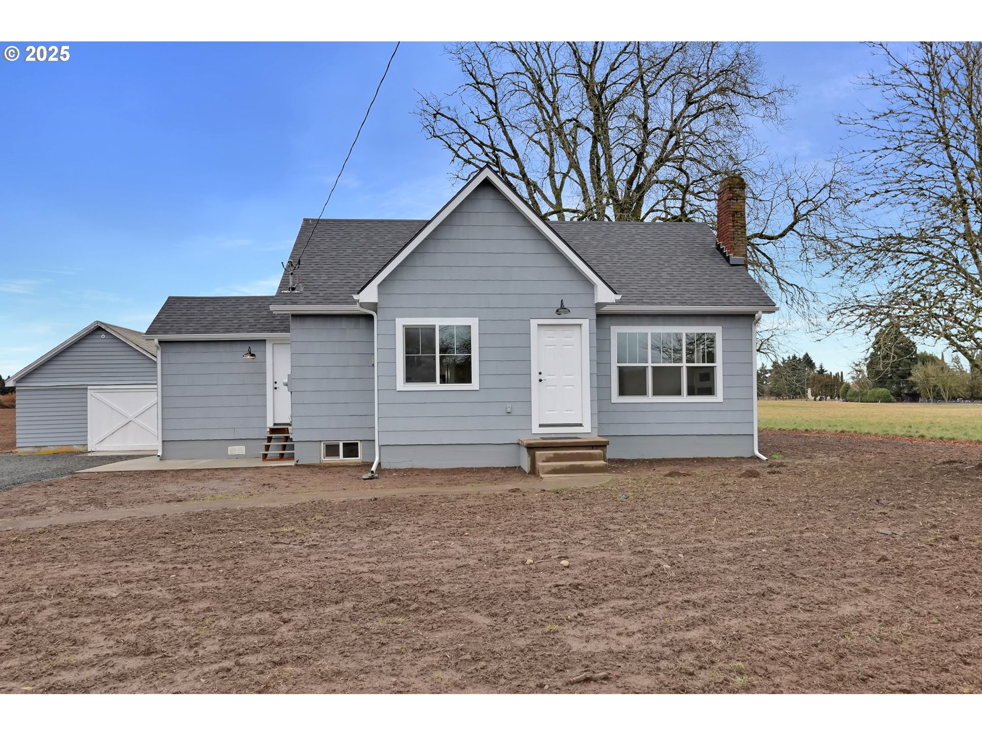 92910 River Road Junction City, OR 97448 - Photo 2 of 43 a view of a house with a yard