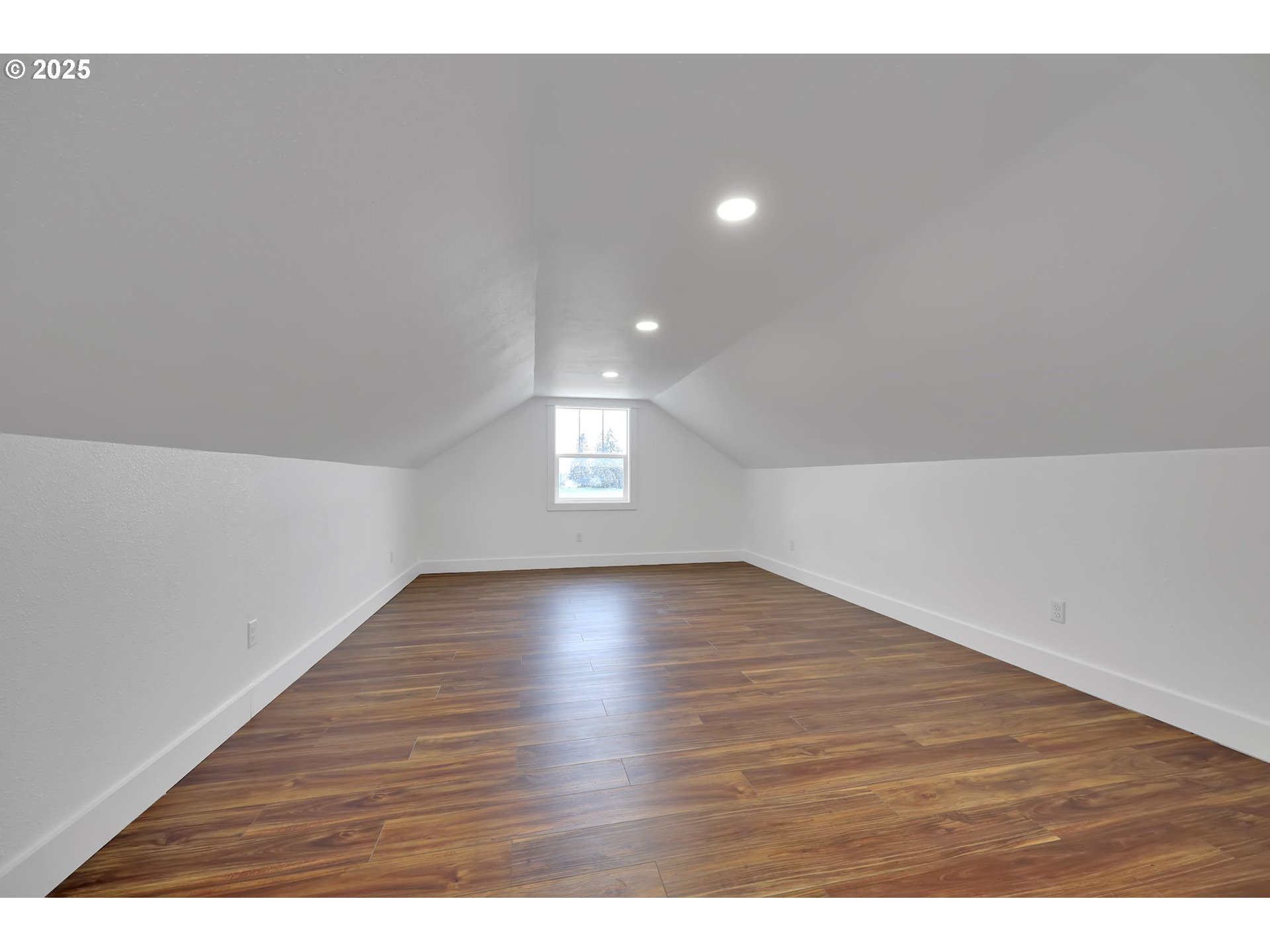92910 River Road Junction City, OR 97448 - Photo 30 of 43 a view of an empty room with wooden floor and window