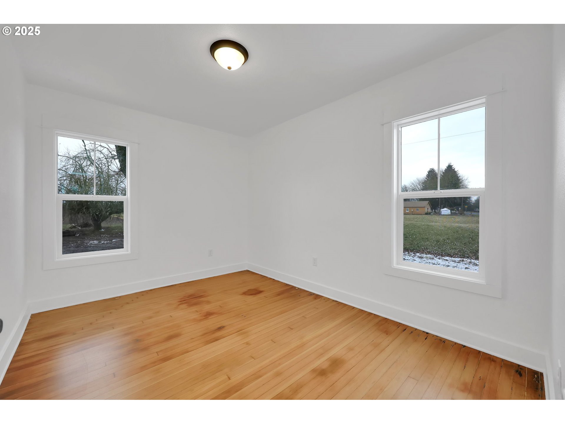 92910 River Road Junction City, OR 97448 - Photo 32 of 43 a view of an empty room with a window