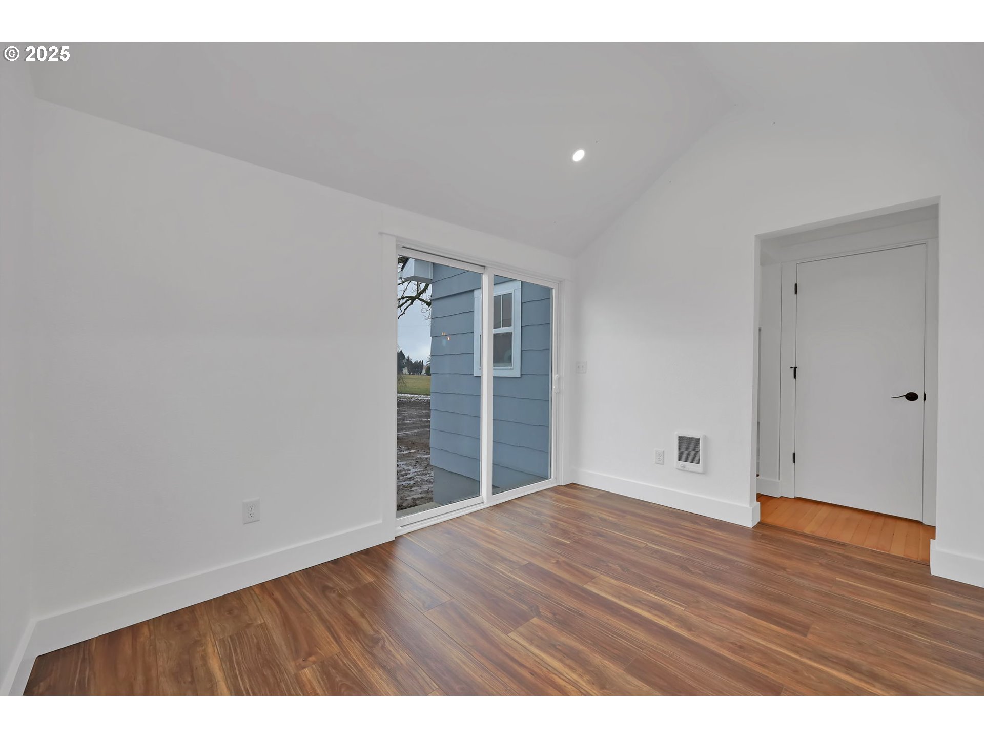 92910 River Road Junction City, OR 97448 - Photo 10 of 43 a view of an empty room with wooden floor