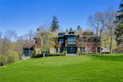 a view of a building with a yard