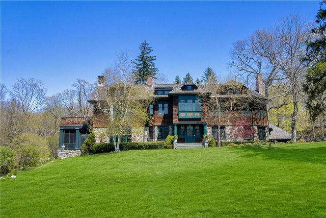 a view of a building with a yard