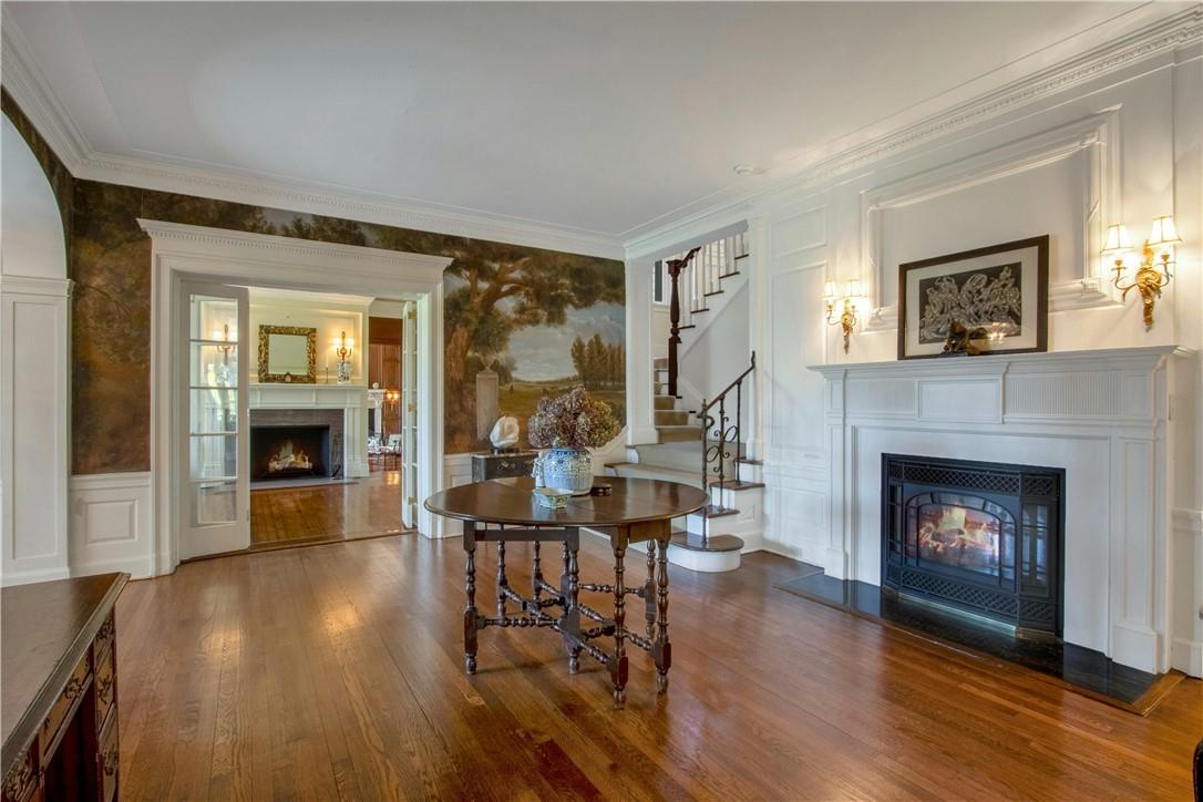 122 Circuit Road Tuxedo Park, NY 10987 - Photo 4 of 35 a living room with furniture and a fireplace