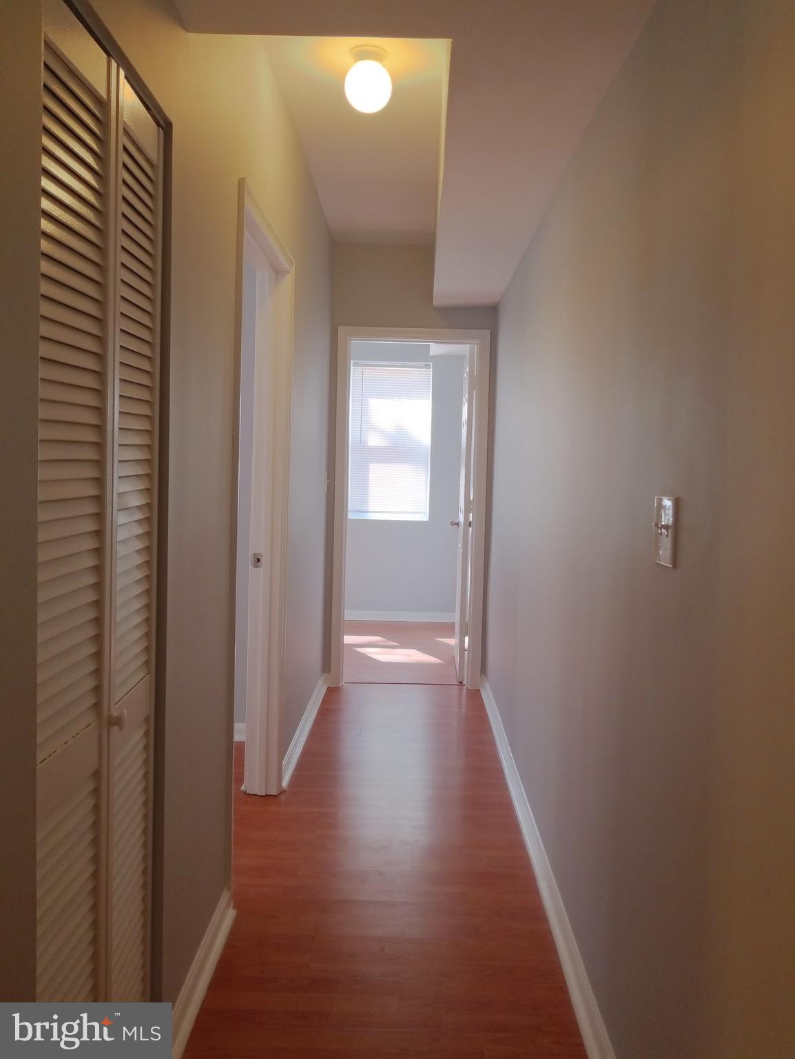 449 Mellon Street Southeast, Unit 1 Washington, DC 20032 - Photo 7 of 10 Hallway fron to back