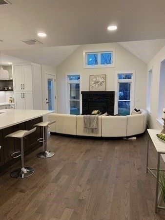 4 Wells Street Natick, MA 01760 - Photo 14 of 38 a living room with furniture and a pool