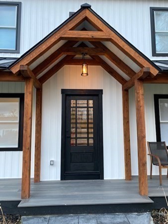 4 Wells Street Natick, MA 01760 - Photo 2 of 38 a front view of a house with entryway