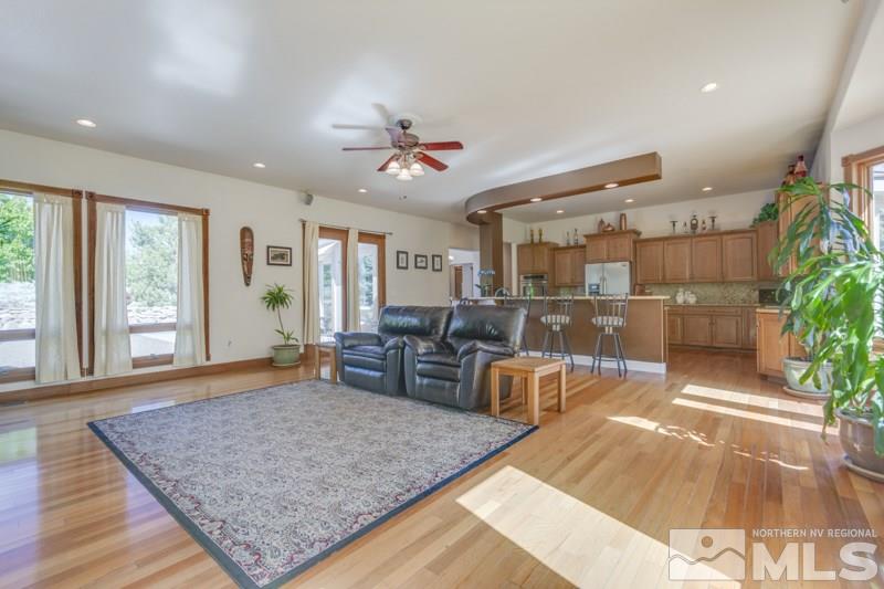 12670 Silver Wolf Road Reno, NV 89511 - Photo 14 of 25 a living room with furniture and a table
