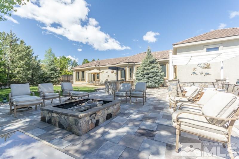 12670 Silver Wolf Road Reno, NV 89511 - Photo 23 of 25 a outdoor space with lots of tables and chairs