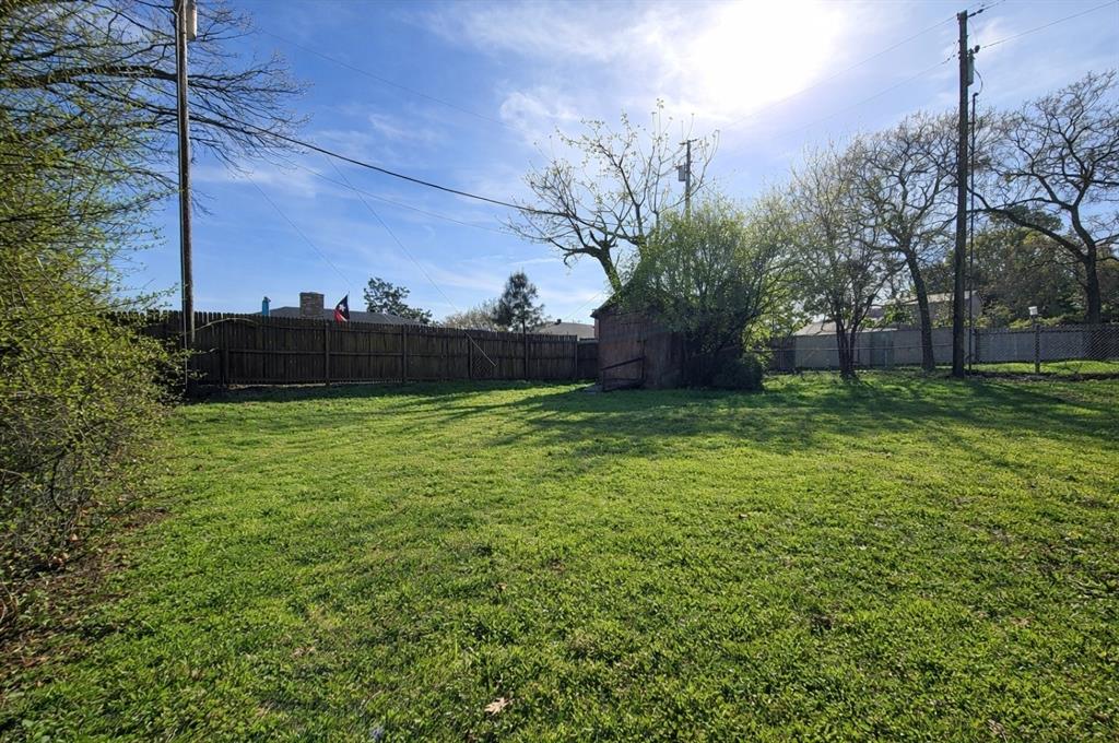 2302 Shiloh Street Denison, TX 75020 - Photo 16 of 16 a view of a backyard