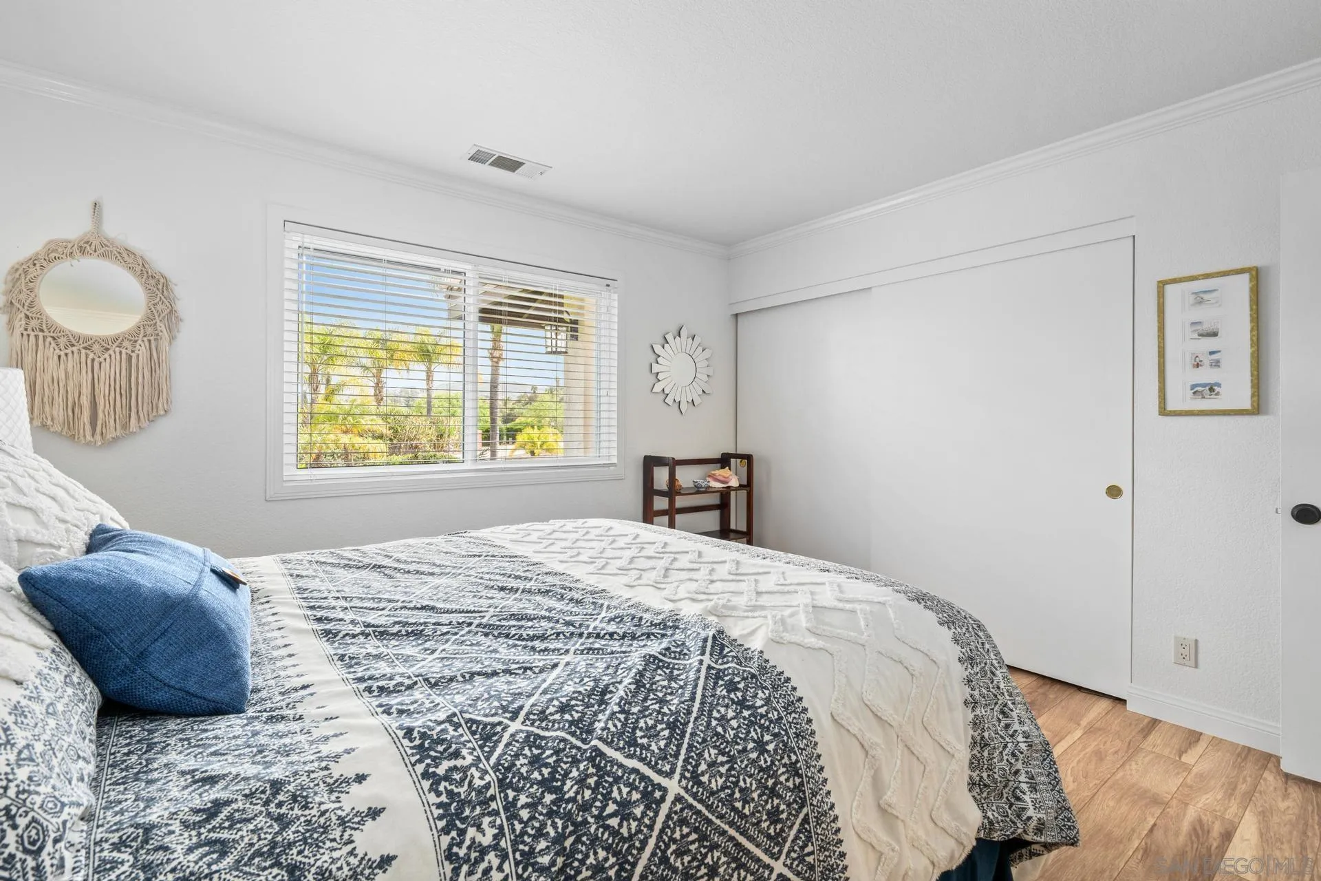 1009 Summit Trail Escondido, CA 92025 - Photo 22 of 59 a bedroom with a bed and a window