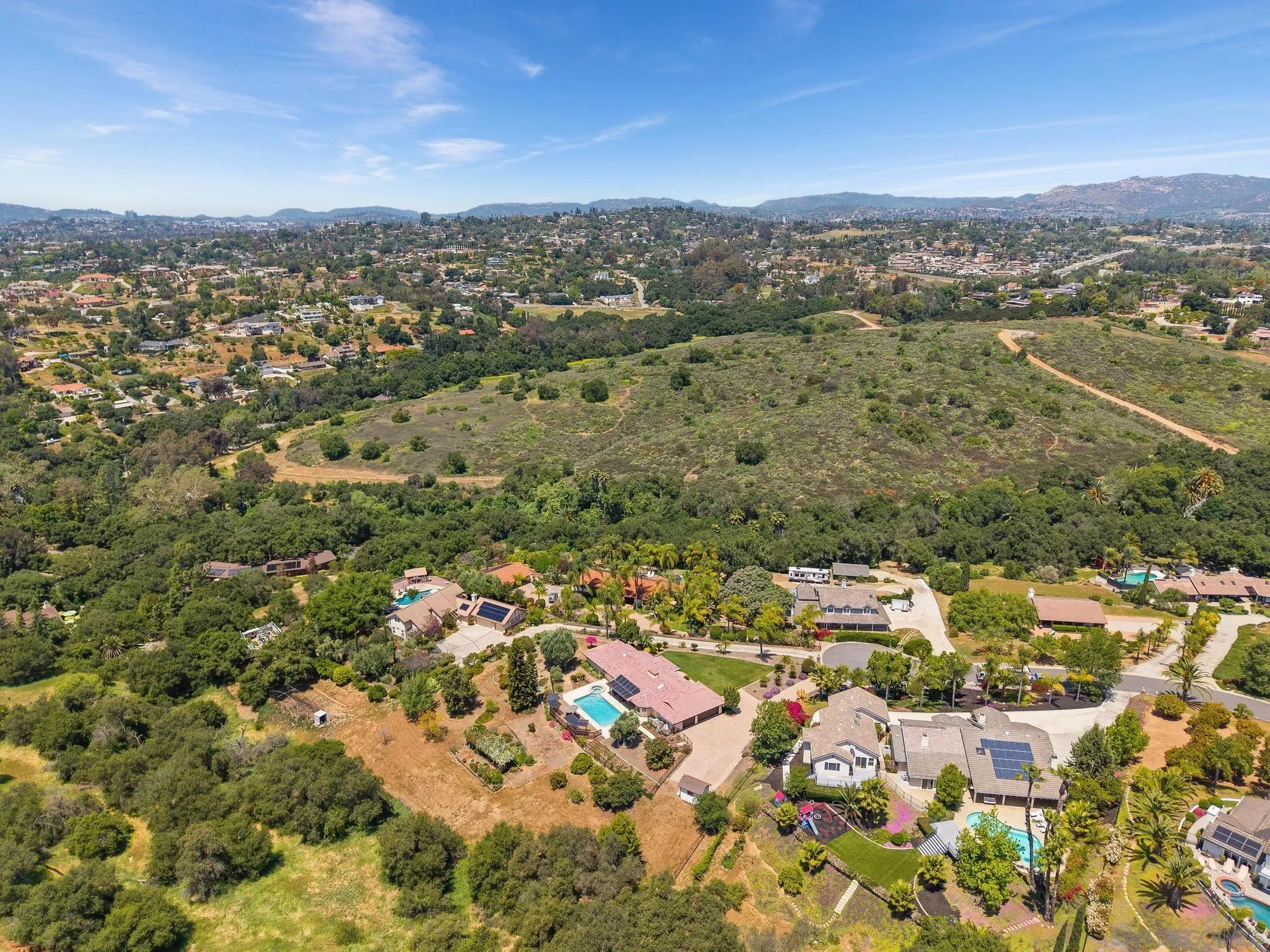 1009 Summit Trail Escondido, CA 92025 - Photo 56 of 59 an aerial view of residential houses with outdoor space