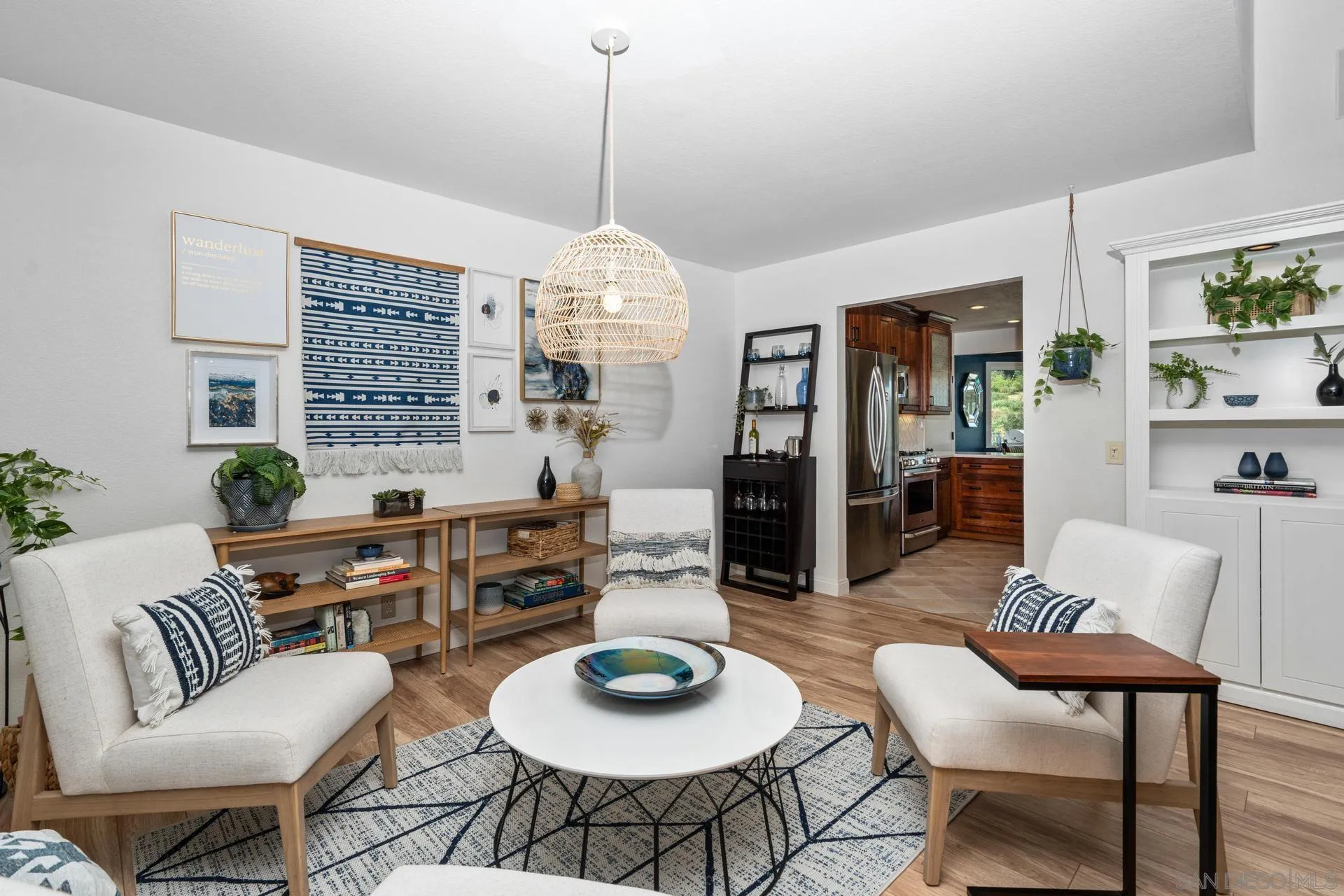 1009 Summit Trail Escondido, CA 92025 - Photo 8 of 59 a dining room with furniture a chandelier and wooden floor