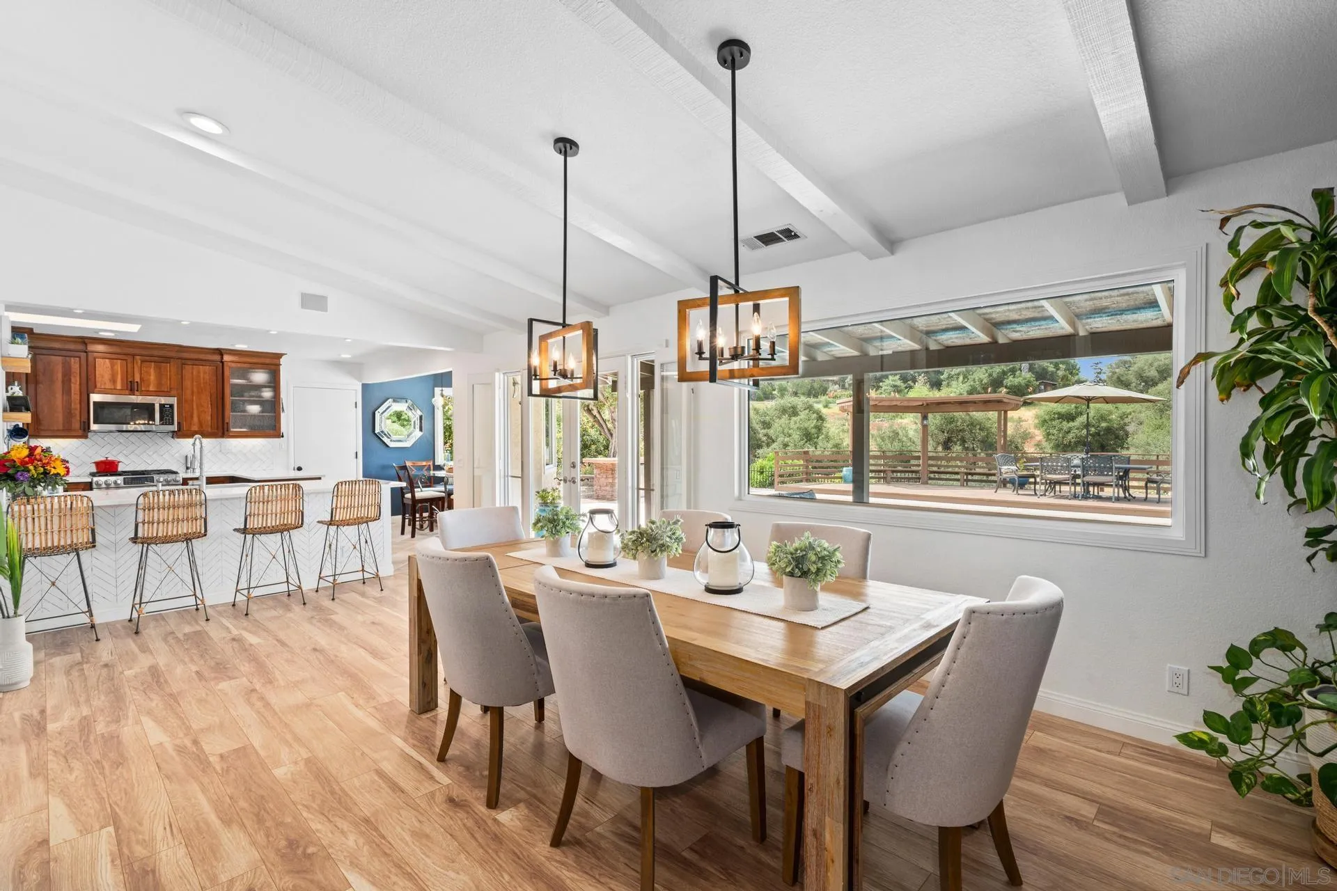 1009 Summit Trail Escondido, CA 92025 - Photo 9 of 59 a view of a dining room with furniture window and outside view