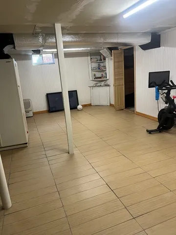 a view of a garage with furniture