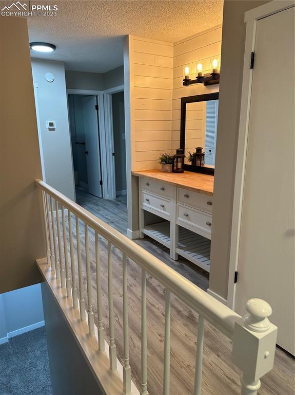 4506 Ridgecrest Drive Colorado Springs, CO 80918 - Photo 11 of 29 a bathroom with a toilet sink and mirror